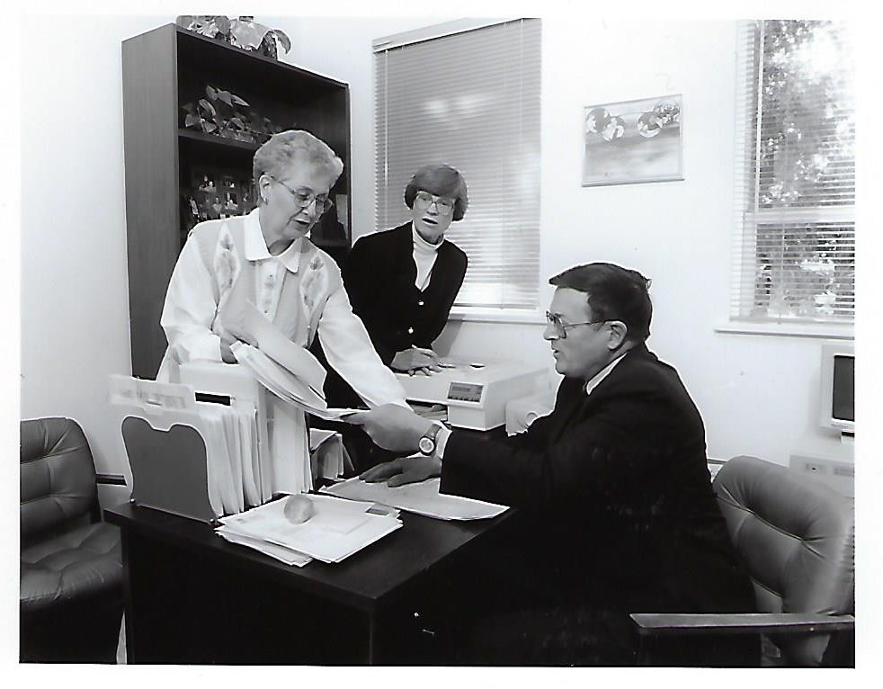Bob & Nancy Ward in the mid-1990s with secretary, Carol.