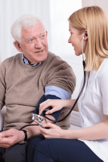 Nurse with an elderly patient