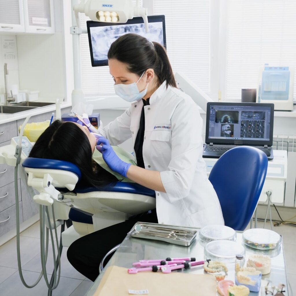 A female professional is checking on her Dental office